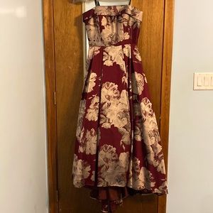 Never worn wine colored floral dress. Size 8